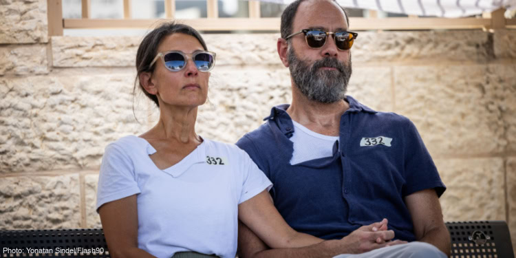 Parents of slain hostage Hersh Goldberg Polin at Har haMenuchot cemetery in Jerusalem.