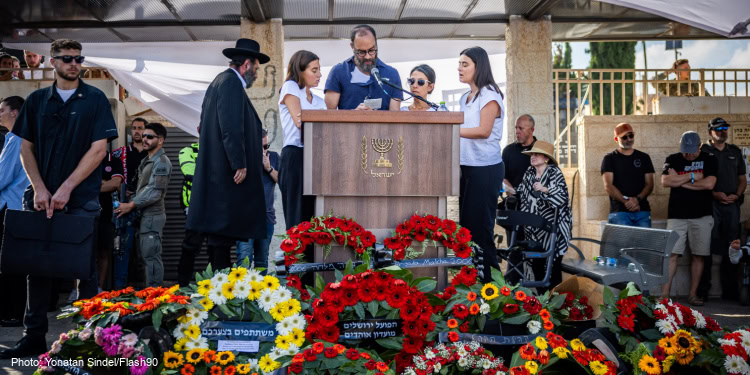 Friends and family attend the funeral of slain hostage Hersch Goldberg Polin at Har haMenuchot cemetery in Jerusalem. Goldberg-Polin was killed in Hamas captivity in the Gaza Strip, September 2, 2024.