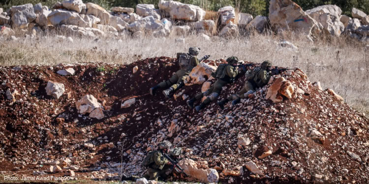 Israeli soldiers operating in the Syrian side of the border fence with Israel, northern Israel, December 9, 2024.