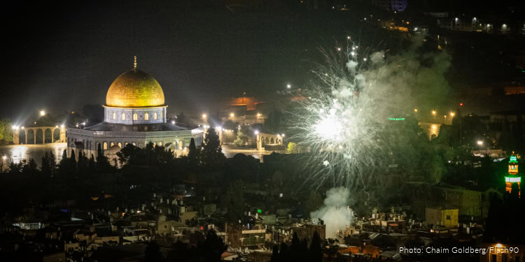 Fireworks light up the sky with Dome of the Rock and Jerusalem's Old City during New Year's celebrations on December 31, 2024.