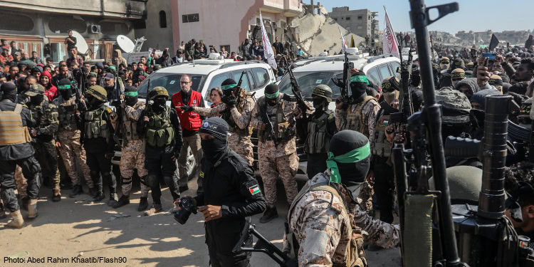 Hamas, Islamic Jihad and thousands of Gazans seen outside the house of Sinwar in Khan Younis, Gaza, where two Israeli hostages were released to the Red Cross on January 30, 2025.