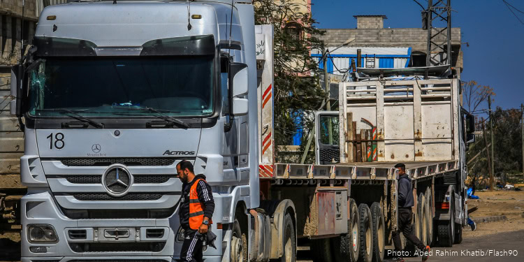 Palestinian trucks parked near the Kerem Shalom crossing, east of the city of Rafah, in the southern Gaza Strip, after Israel has stopped the entry of all humanitarian aid into Gaza, March 2, 2025.