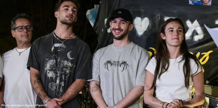 Former hostages Omer Shem Tov and Maya and Itay Regev attend a rally for the release of Israeli hostages held in the Gaza Strip in Herzliya, March 13, 2025