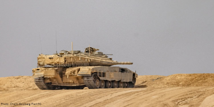 An Israeli tank seen on the Israeli border with the Gaza Strip, May 18, 2025.