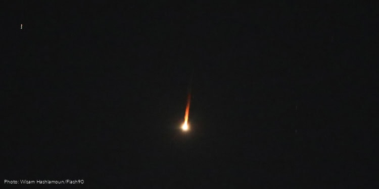 An Israeli air defense system launches interceptor missiles toward an incoming ballistic missile fired from Yemen, as seen from the West Bank city of Hebron, July 16, 2025.