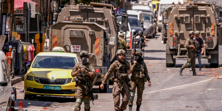 Israeli security forces raid the West Bank city of Ramallah, August 26, 2025.