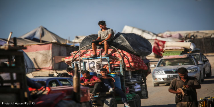 Palestinians who fled combat zones in the Gaza Strip arrive in a safer area in central Gaza, September 9, 2025