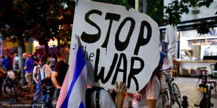 Israelis attend a protest around the Ministry of Defense in Tel Aviv, calling for an end to the war with Gaza, and the release of the remaining Israeli hostages held by Hamas captives. September 30, 2025