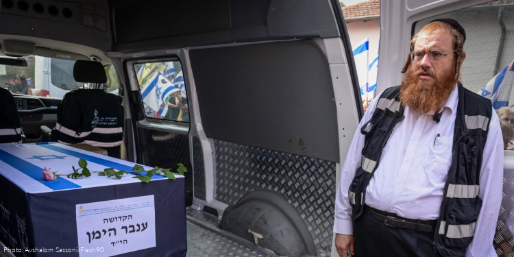 People pay their respects during the funeral service of slain Israeli hostage Inbar Hayman in Rishon LeTzion, October 17, 2025.