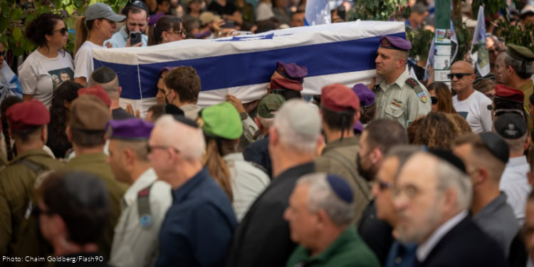 Family and friends of Col.l Asaf Hamami during his funeral in Kiryat Shaul Cemetery in Tel Aviv, November 4, 2025, Hamami was killed in battle on October 7, 2023, his body was held by Hamas terrorists in Gaza and released to Israel a few days ago.
