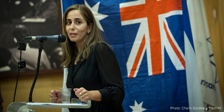 People attend a ceremony in memory of the victims of the mass shooting attack in Sydney targeting the Jewish community during Hanukkah celebrations, at the World Zionist Organization (WZO) building, December 15, 2025.