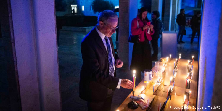 People attend a ceremony in memory of the victims of the mass shooting attack in Sydney targeting the Jewish community during Hanukkah celebrations, at the World Zionist Organization (WZO) building, December 15, 2025.
