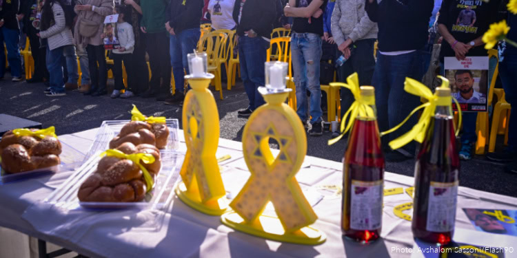Relatives, friends and supporters of Master Sgt. Ran Gvili, whose body is held by Hamas, attend a Kabbalat Shabbat ceremony and the lighting of Hanukkah candles at Hostage Square in Tel Aviv, calling for the return of his body from Hamas captivity, on January 2, 2026.