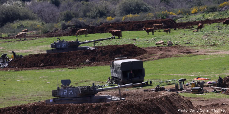 Israeli military vehicles and tanks are seen along the Israeli border with Lebanon amid the ongoing war with Iran and Hezbollah, March 8, 2026. Photo by David Cohen/Flash90