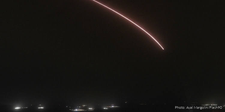 Ballistic missiles fired from Lebanon are intercepted by Israel’s air defense system over northern Israel, March 11, 2026.