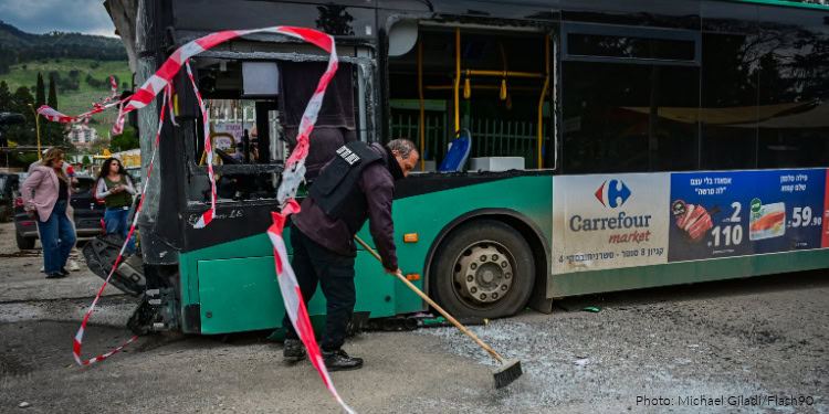 Israeli security and rescue forces at the scene where a missile fired from Lebanon toward Israel caused damage in the northern Israeli city of Kiryat Shmona, March 23, 2026.