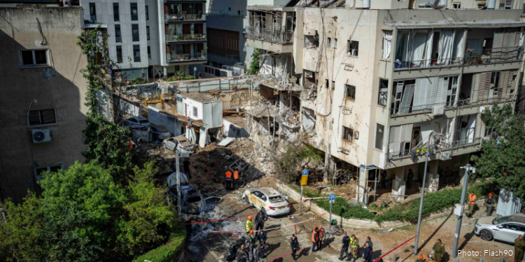 sraeli security and rescue forces at the scene where a missile fired from Iran toward Israel caused damage in Tel Aviv, March 24, 2026.