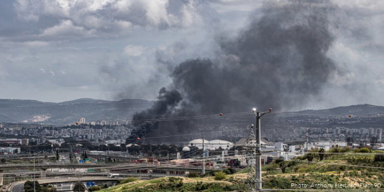 Smoke rises from the oil refineries in Haifa, northern Israel, following a missile strike fired from Iran toward Israel, March 30, 2026.