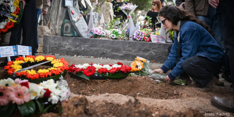 Friends and family attend the funeral of Vladimir and Lena Gershovich and their son Dmitry, who were killed by an Iranian missile strike in Haifa days earlier, at Sde Yehoshua Cemetery in Haifa, April 7, 2026.
