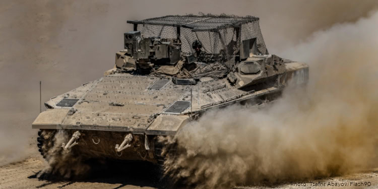 Israeli soldiers are seen near the Israeli border with the Gaza Strip,