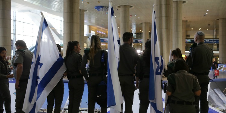 border police soldiers with flags