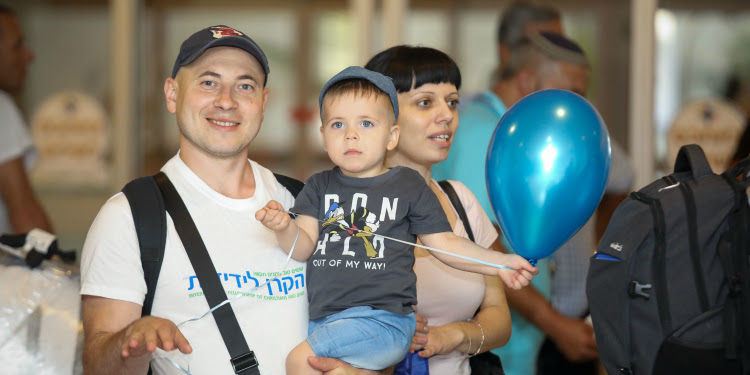 Father and his son who just arrived on a Fellowship freedom flight.