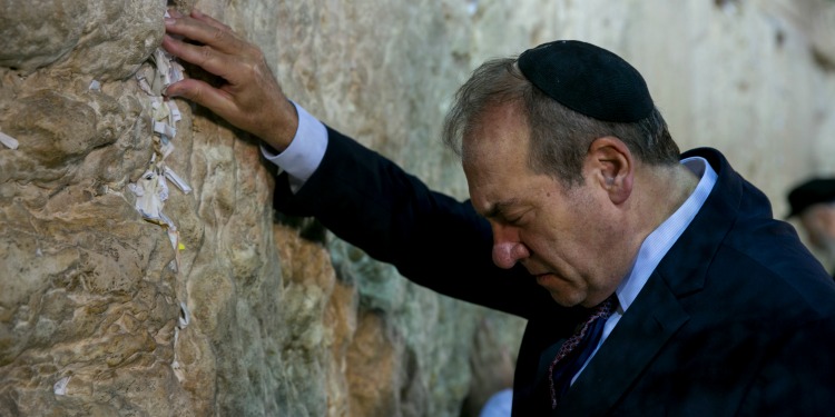 Rabbi Eckstein praying at Western Wall.