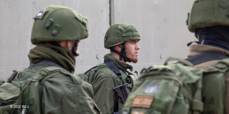 Three soldiers in uniform at the Gaza outpost.