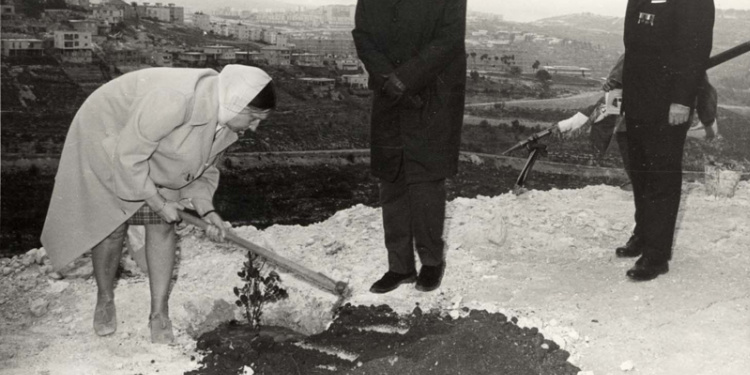 GermaIne Ribiere planting tree at Yad Vashem in Jerusalem, 1967