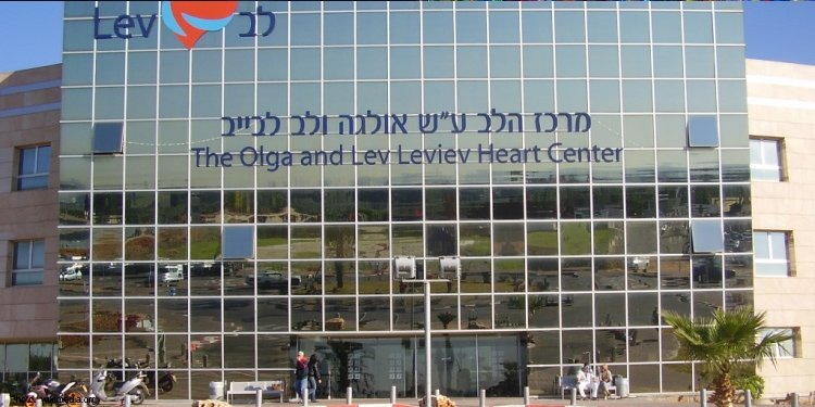 The Olga and Lev Leviev Heart Center building with people walking in and out.