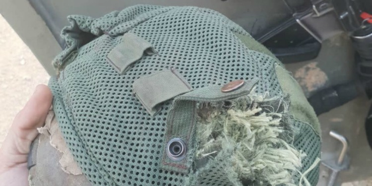 Close up image of a helmet that saved IDF soldier from sniper.