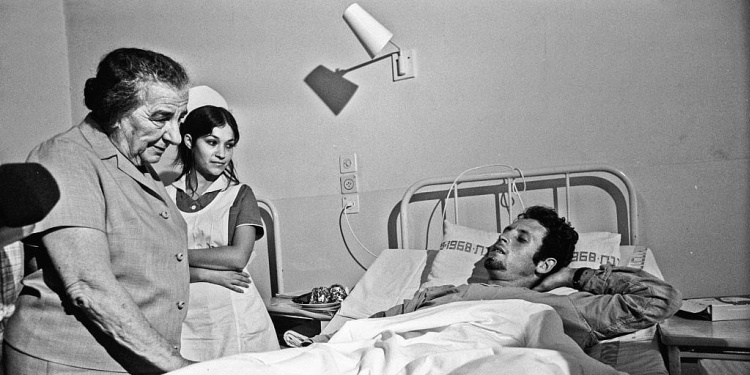 Ukraine-born Israel Prime Minister Golda Meir visits wounded IDF soldier, 1973