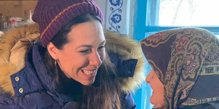 Yael with elderly woman in Ukraine, 2020
