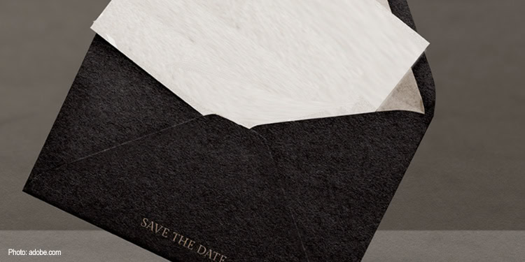 Image of a black envelope with an invitation inside