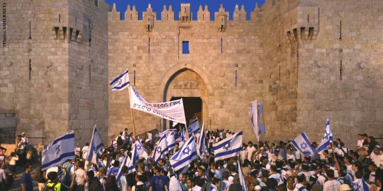 People with Jewish flags celebrating Jerusalem Day