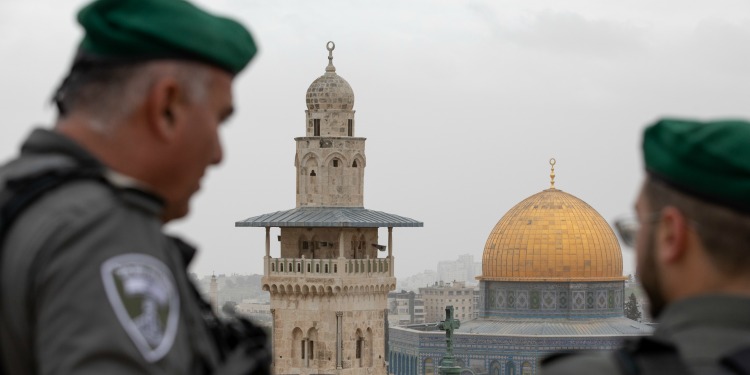 Two border policemen overlooking Temple Mount.