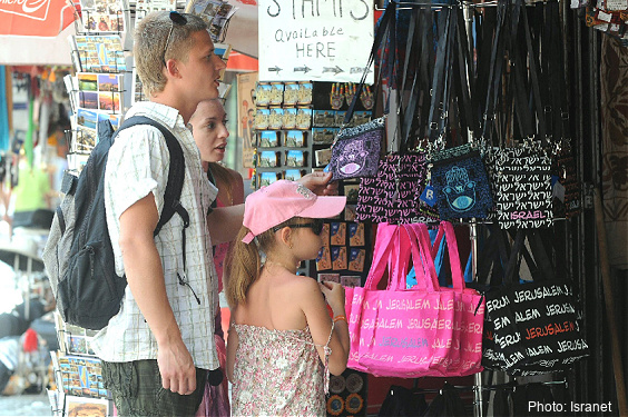 Tourists shopping in the Old City of Jerusalem. 