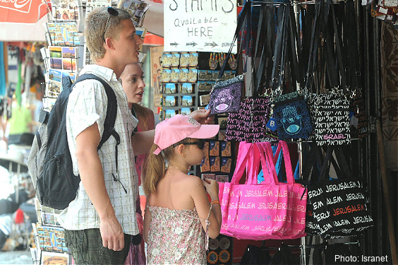 Tourists shopping in the Old City of Jerusalem.
