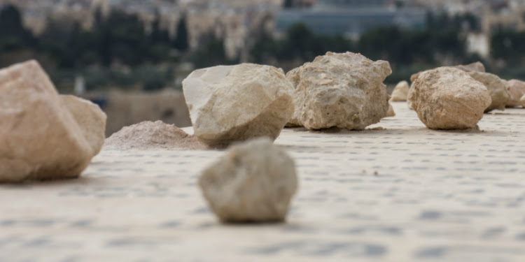 stones resting on top of a Jewish grave
