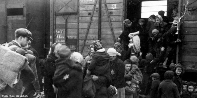 Jews being unloaded from a cattle car at Auschwitz-Birkenau, May 1944 during the Holocaust