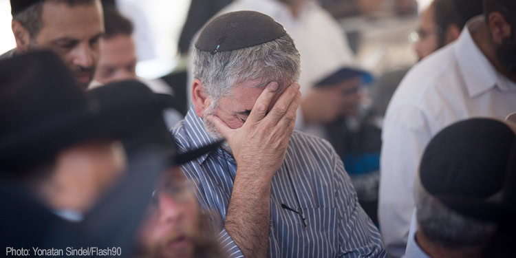 Jews visit at the grave of Rabbi Ovadia Yosef at the Sanhedriya cemetery in Jerusalem