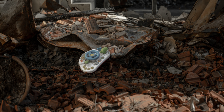 Child's toy amid destruction on Kibbutz Be'eri from October 7.