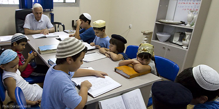 Kids sitting in a classroom