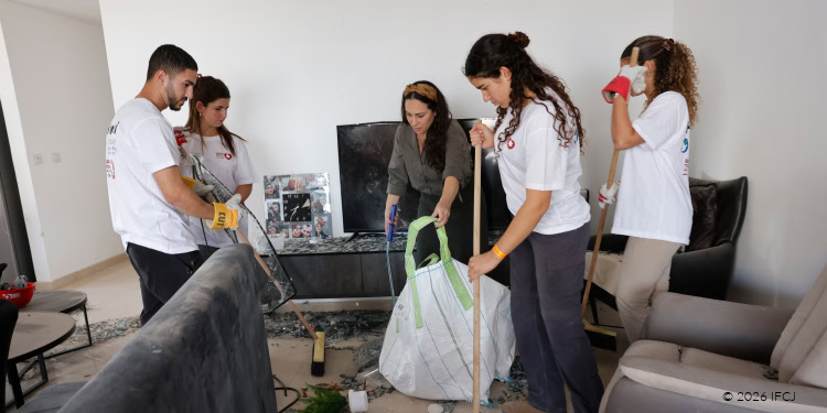 Group of volunteers helping with home repairs and community support, demonstrating compassion and teamwork at IFCJ.