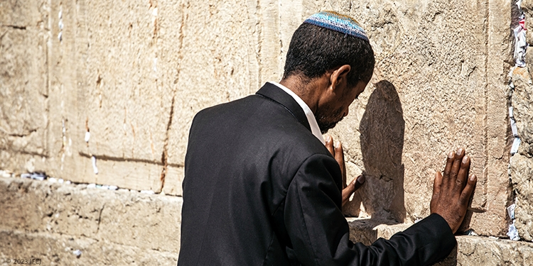 Man praying at the Western Wall