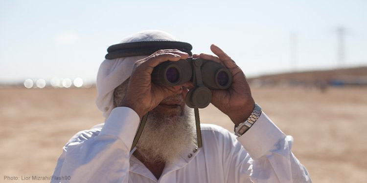 Man with binoculars
