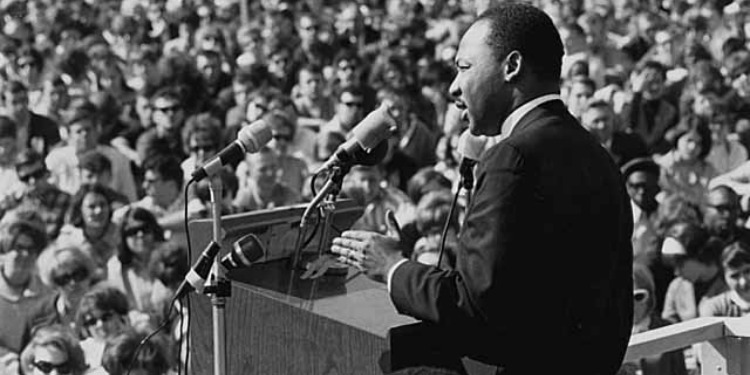 Photo of Martin Luther King from behind giving his famous I Have A Dream speech