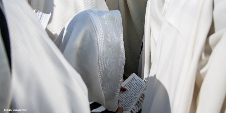 Men praying at the Western Wall.