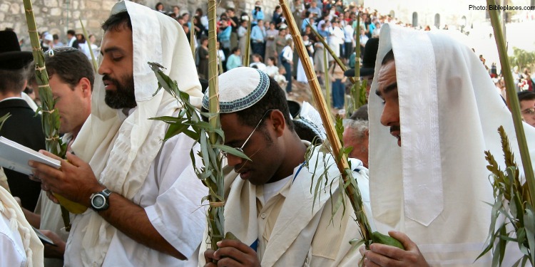 Men attending a sukkot blessing. What sukkot is known as and more