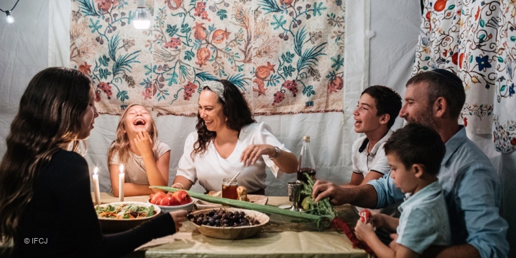 Eckstein family in sukkah for Sukkot